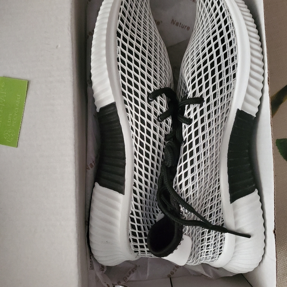 Black and white mesh tennis